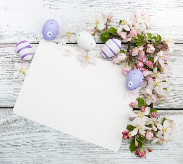 Easter eggs and greeting card — Stock Photo, Image