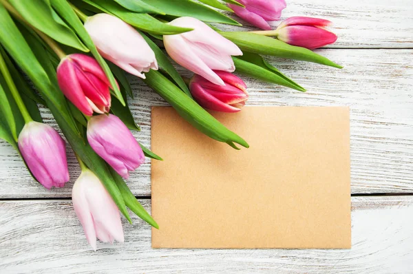 Spring tulips flowers and greeting card — Stock Photo, Image