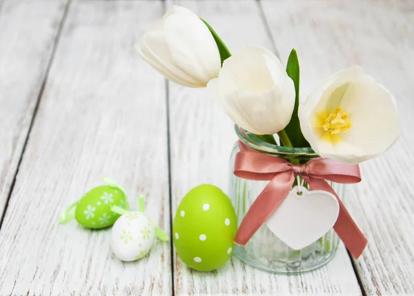 Easter eggs and tulips — Stock Photo, Image