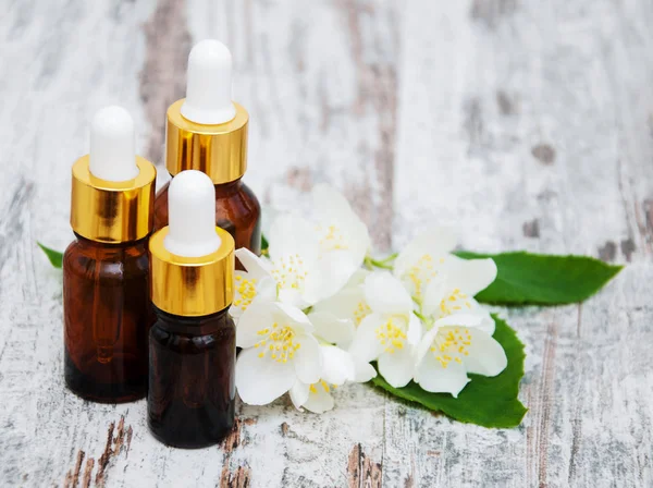 Bottles with massage oils — Stock Photo, Image