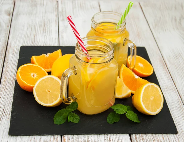 Jar with orange juice — Stock Photo, Image