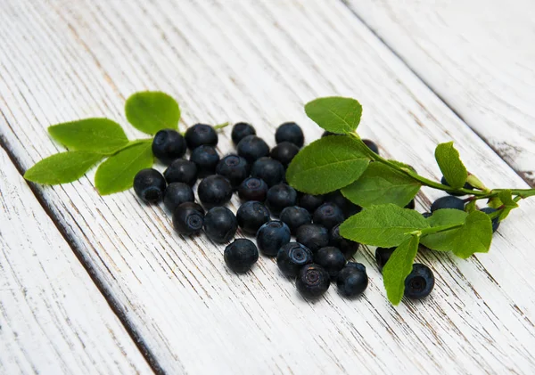 Blueberries on a old wooden background — Stock Photo, Image