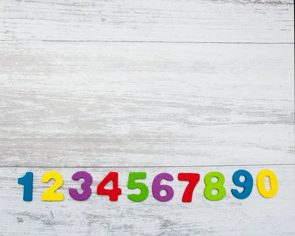 Kolorowe drewniane numery — Zdjęcie stockowe