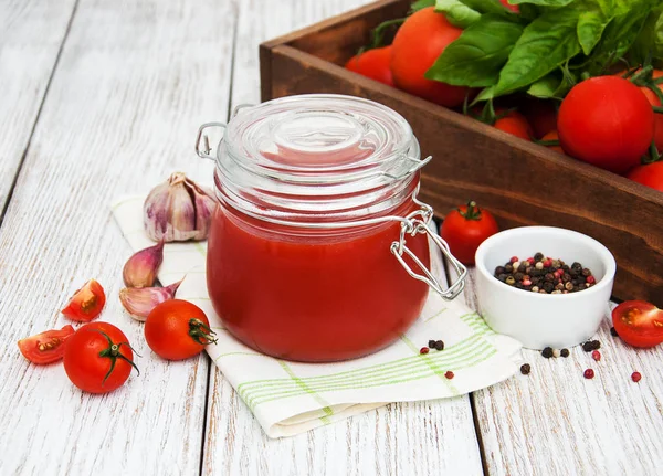 Jar with tomato sauce — Stock Photo, Image