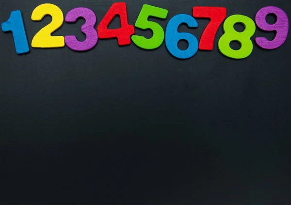 Kolorowe drewniane numery — Zdjęcie stockowe