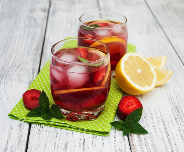 Glasses of lemonade with strawberries