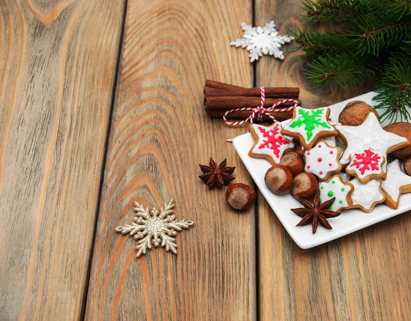 Christmas cookies and nuts on a plate — Stock Photo, Image