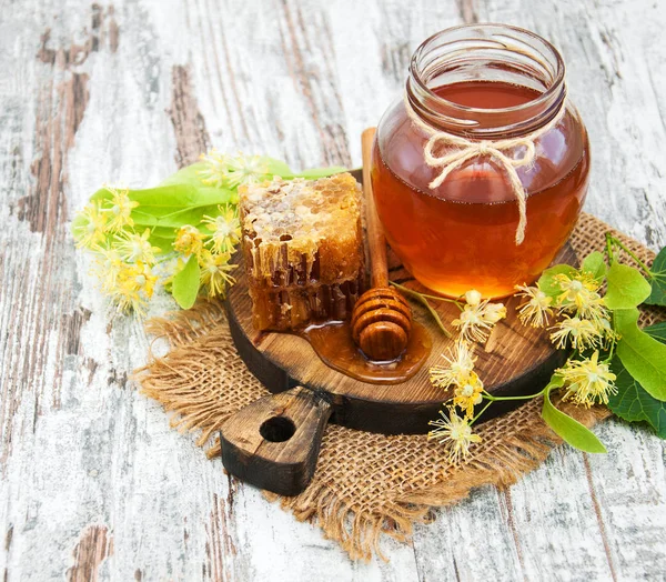 Honey and  linden flowers — Stock Photo, Image