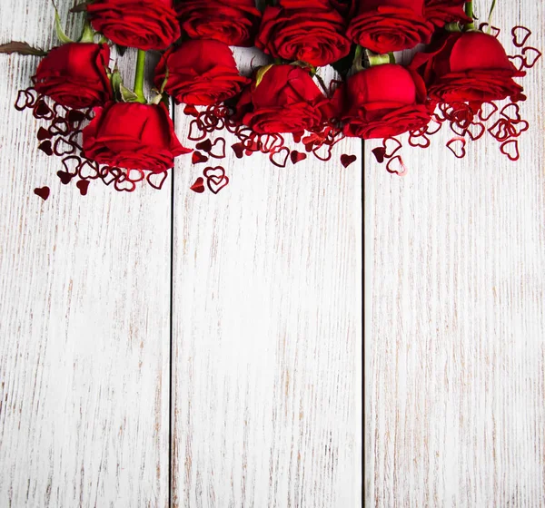 Rosas rojas y corazones — Foto de Stock