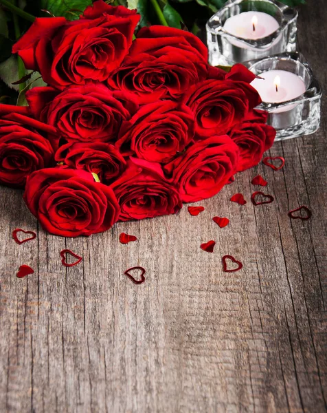 Red roses and candles — Stock Photo, Image