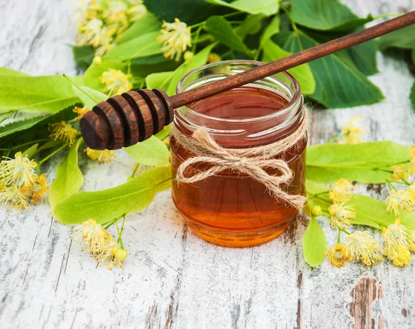 Honey and  linden flowers — Stock Photo, Image