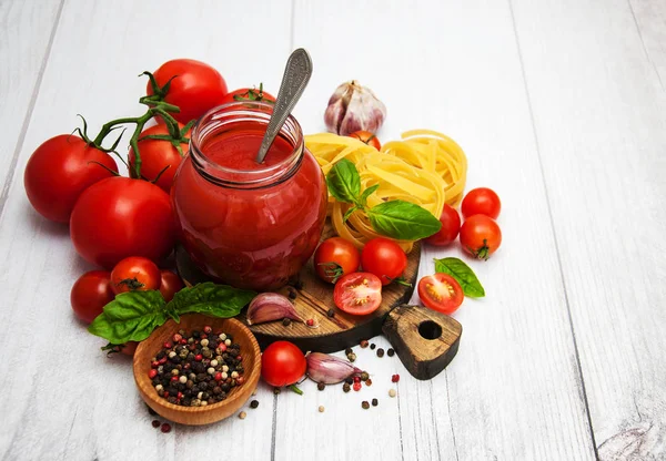 Jar with tomato sauce — Stock Photo, Image