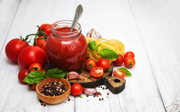Jar with tomato sauce — Stock Photo, Image