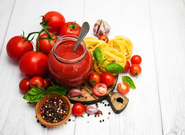 Jar with tomato sauce — Stock Photo, Image