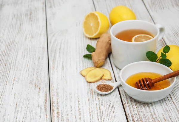 Cup of tea with lemon and ginger — Stock Photo, Image