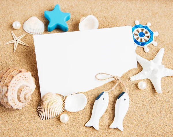 Shells, seastars and an blank postcard — Stock Photo, Image