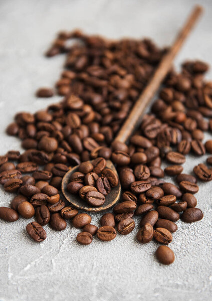 Coffee beans on a stone background