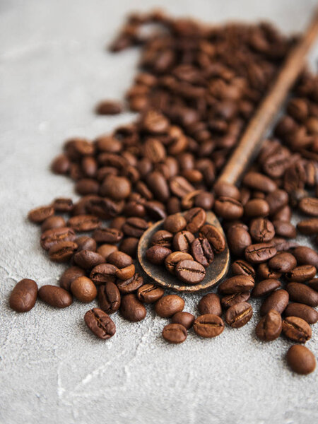 Coffee beans on a stone background