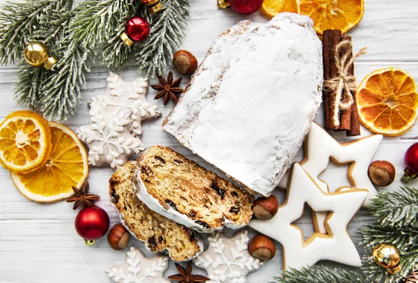 Christmas stollen on wooden background — Stock Photo, Image