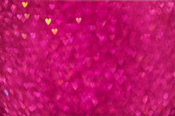 Růžové srdce bokeh. — Stock fotografie