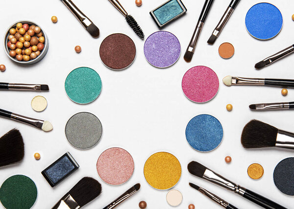 Set of decorative cosmetics on a white background. Flat lay, top view.