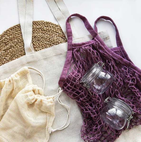 Cotton bags, net bag with reusable  glass jars. Zero waste concept. Eco friendly. Flat lay