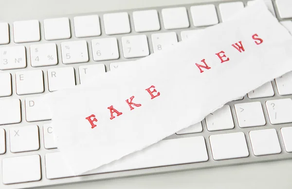 Words Fake News Written Torn Paper Computer Keyboard — Stock Photo, Image