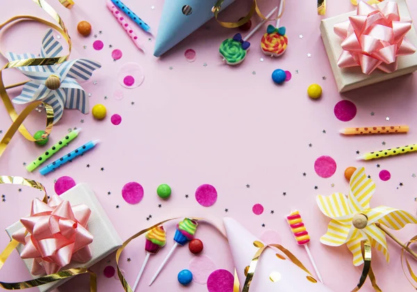 stock image Happy birthday or party background.  Flat Lay wtih birthday balloons , confetti and ribbons on pink background. Top View.  Copy space.