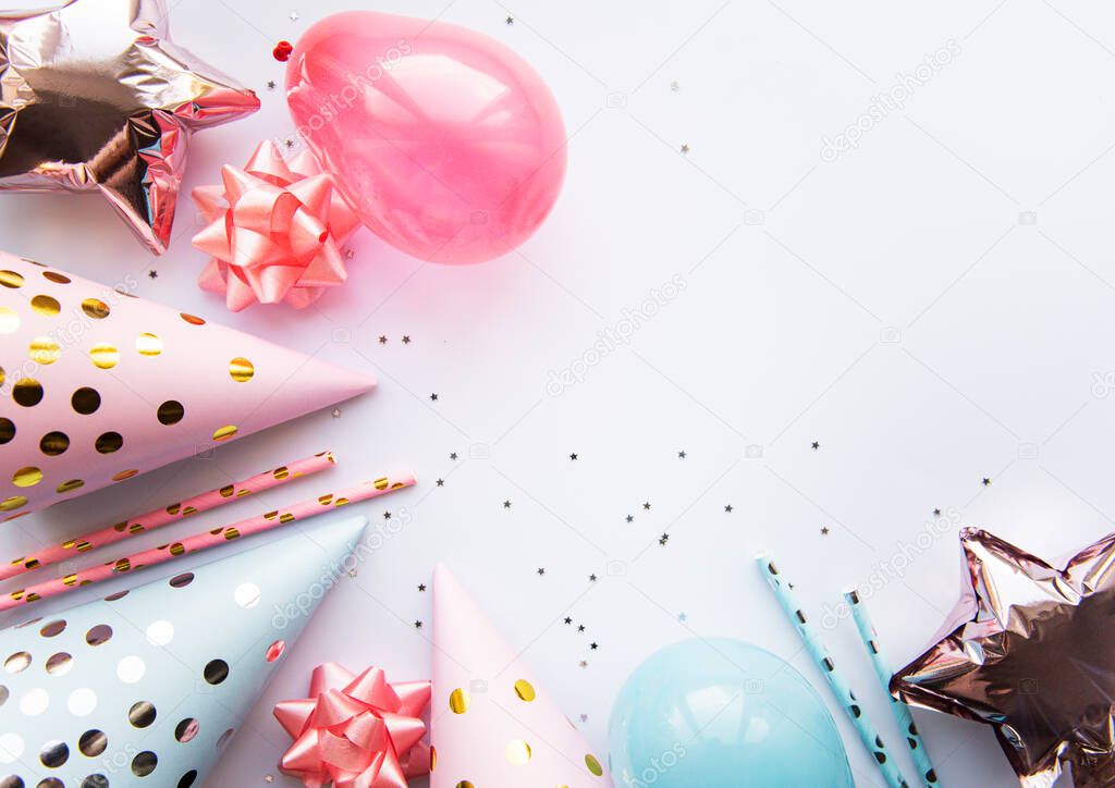 Happy birthday or party background.  Flat Lay wtih birthday balloons , confetti and ribbons on white  background. Top View.  Copy space.