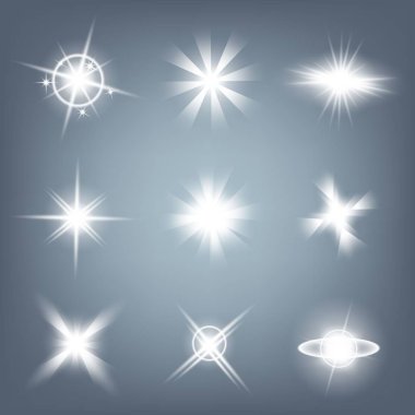 Parlak ışık efektlerinden oluşan yaratıcı bir konsept vektör kümesi siyah arka planda izole edilmiş kıvılcımlarla parlar. Resim tasarımı için, Noel kutlaması için pankart, sihirli ışık ışını