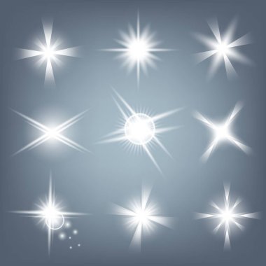 Parlak ışık efektlerinden oluşan yaratıcı bir konsept vektör kümesi siyah arka planda izole edilmiş kıvılcımlarla parlar. Resim tasarımı için, Noel kutlaması için pankart, sihirli ışık ışını