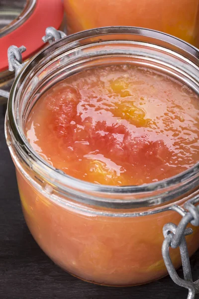 Citrus jelly in a glass jar