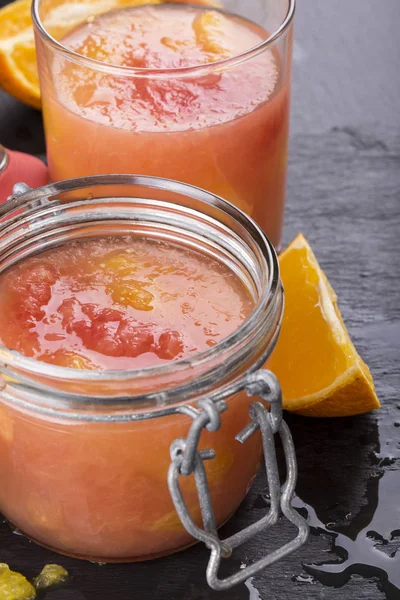 Citrus jelly in a glass jar