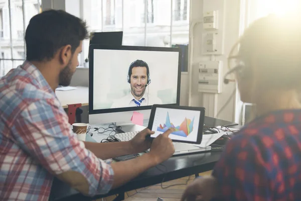 Coworkers doing a video conference in the conference room — Stock Photo, Image