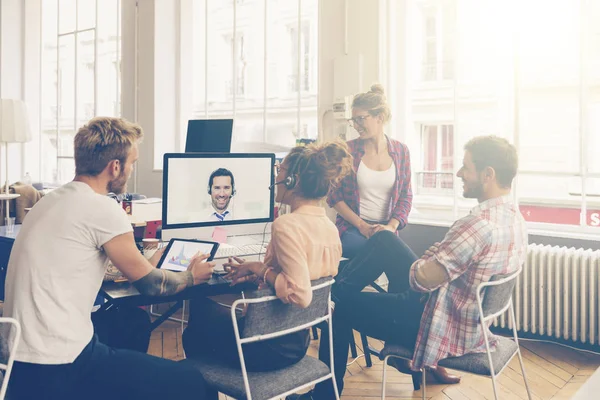Coworkers doing a video conference in the conference room — Stock Photo, Image