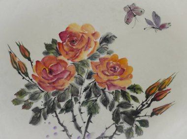 iki kelebek ve turuncu gül buketi