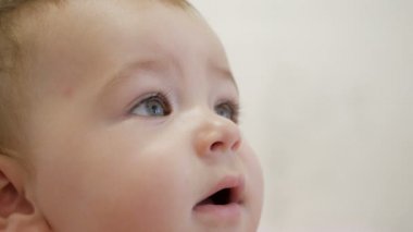 Baby is watching closely