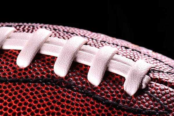 Banner de bola de futebol americano no fundo preto — Fotografia de Stock