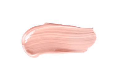 Sıvı bazlı boya darbeleri beyaza izole edilmiş. Kozmetik makyaj vakfı beyaz arka planda izole edilmiş, ton kremi lekeli, kapatıcı. Smar vuruşu.