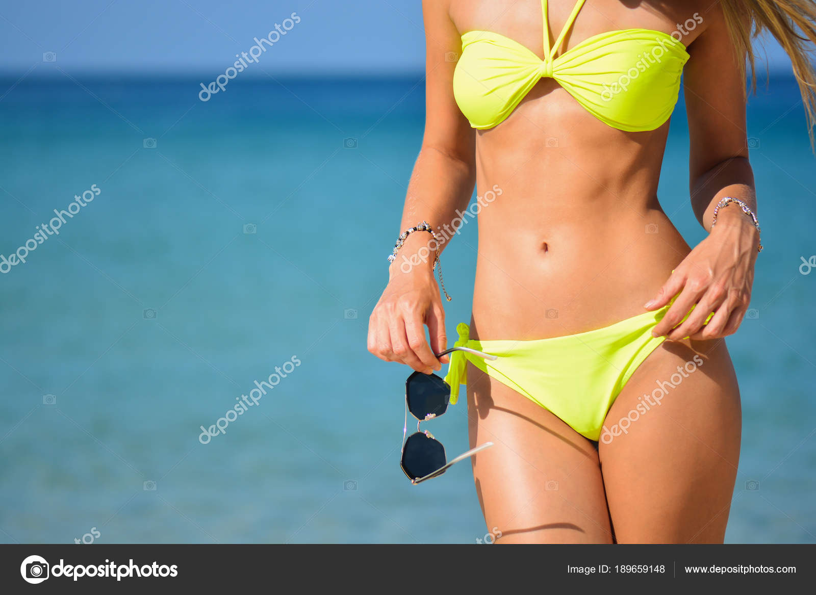 girl in yellow swimsuit