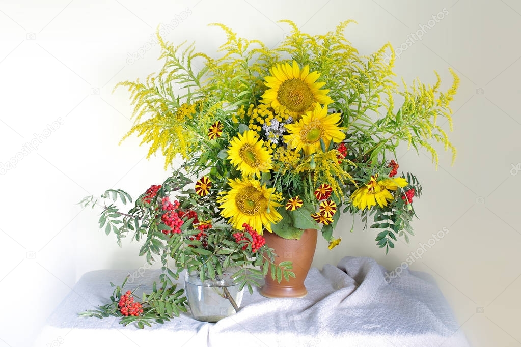 A beautiful bouquet with sunflowers and Rowan