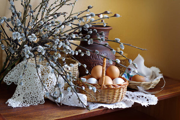 Easter still life with willow branches and beautiful eggs.Retro still life.