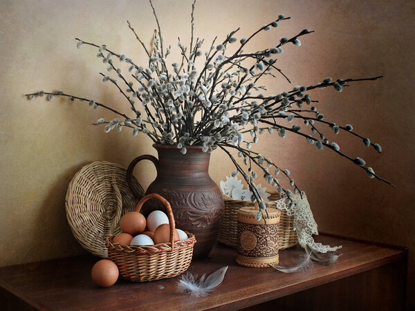 Easter still life with willow branches and beautiful eggs.Retro still life.