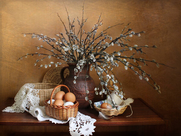 Easter still life with willow branches and beautiful eggs.Retro still life.
