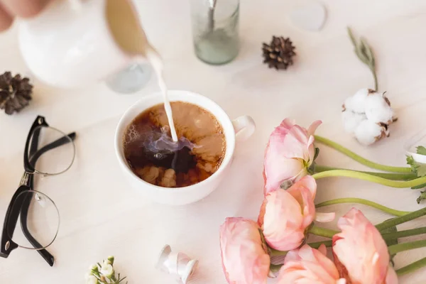 Cute vintage photography with flowers. Flat lay top view.