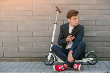 Scooter adam tekme