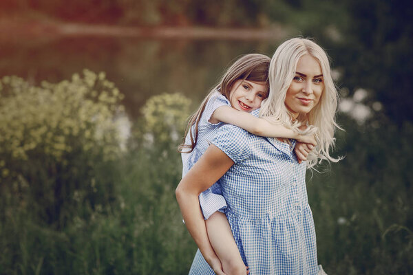 mom and daughter outside