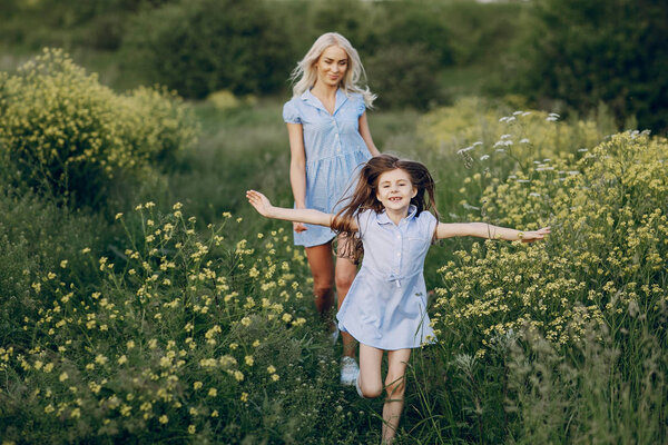 mom and daughter outside