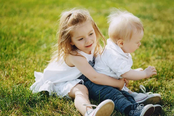 Children on a grass — Stock Photo, Image