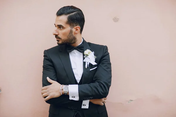 Stylish groom black suit — Stock Photo, Image